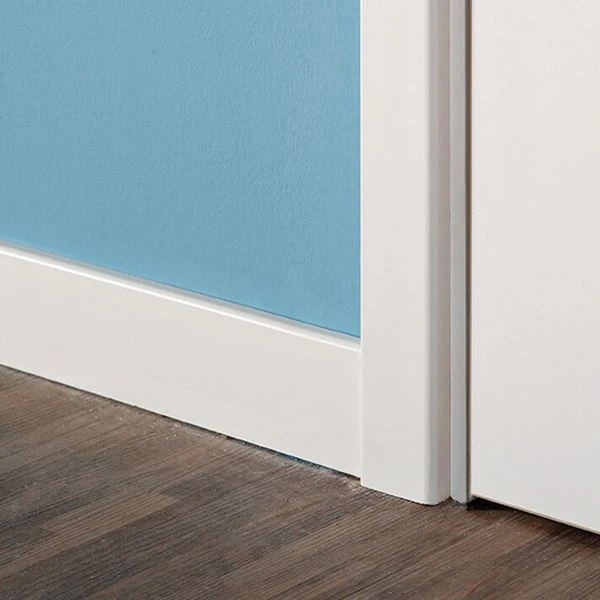 White PVC crown moulding profile showing classical cove and bead geometry with smooth extruded surface finish against white background White PVC crown moulding profile showing classical cove and bead geometry with smooth extruded surface finish against white background